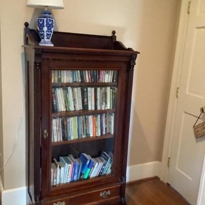 $525-- Bookcase with glass door with a key and one drawer 60"H 32"L 15"depth
