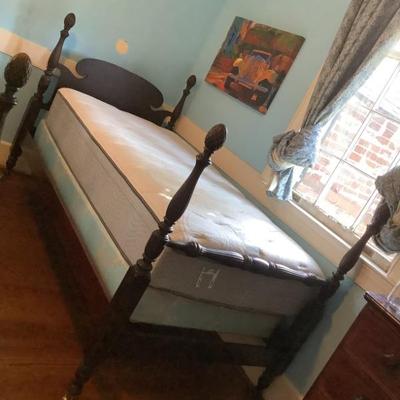 $175 each (2 in sale) twin wooden beds, one bed on casters, 40”H head, 29”H foot, 47”H posts 