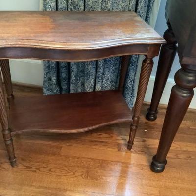 $65-2 tier accent table, needs a little attention to the top
23”H 24”L 12”depth