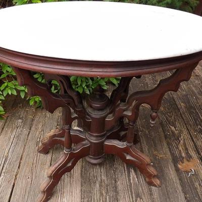 Fancy Oval Marble Top Table As Found. 