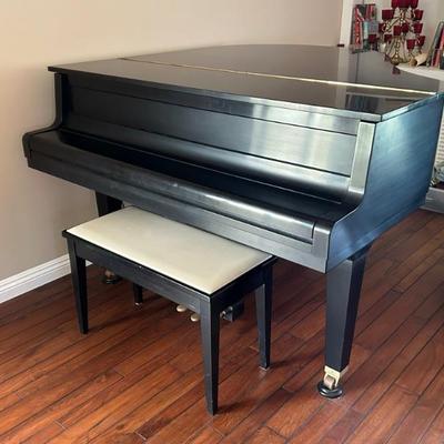 This Yamaha Baby Grand Piano is available for pre- sale. Call 714 499-4199 for additional info. 