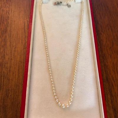 Beautiful Pearl necklace with Sapphire clasp. 