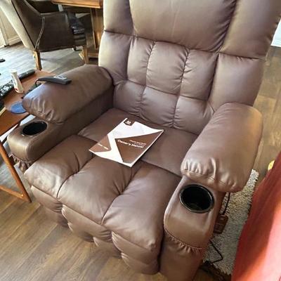 Beautiful, leather Mcombo power lift recliner with heat and massage. Like new condition. 