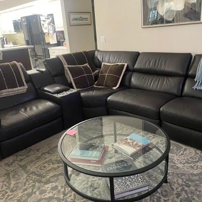Natuzzi Leather sectional and pottery barn table