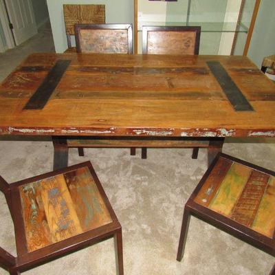 Great table with four chairs. Matching buffet also available