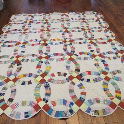 All quilts are hand quilted.  The quilting on them is absolutely beautiful