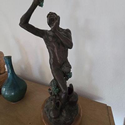 Many statues on pedestals