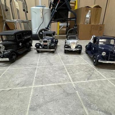 #50602 • (4) Police Car Decanters

