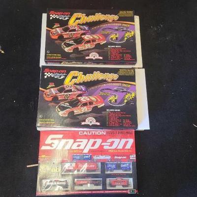#10066 • (2) Snap-on Racing HO Scale Electric Racing Challenge Sets and (1) Snap-on HO Scale Electric Train Set

