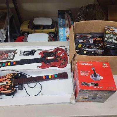 #1510 • PS2 Guitar Controllers, PS2 Games, and Logictech Wingman Attack Controller
