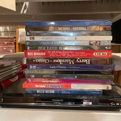 #60882 • Panasonic Blu-Ray Player with Unopened DVDs and CDs
