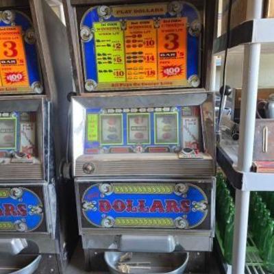 #13638 • Bally Dollar Vintage Slot Machine
