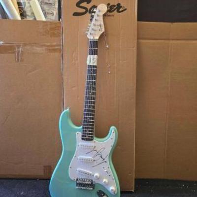 #10504 • Michael Jackson Autographed Fender Squier Electric Guitar
