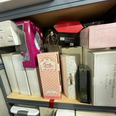 #10178 • 21 Boxes of Dolls
