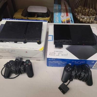 #1508 • (2) PlayStation 2
