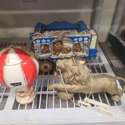 #1052 • (2) Circus Decanters and Lion
