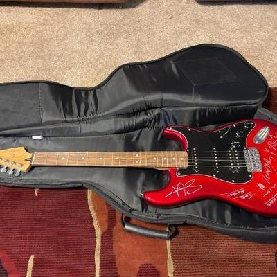 #60872 • Autographed Fender Stratocaster Electric Guitar with Case
