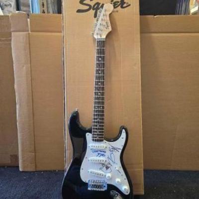 #10516 • Motley Crue Autographed Fender Squier Bullet Electric Guitar
