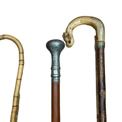 Three Antique Carved Wood Canes