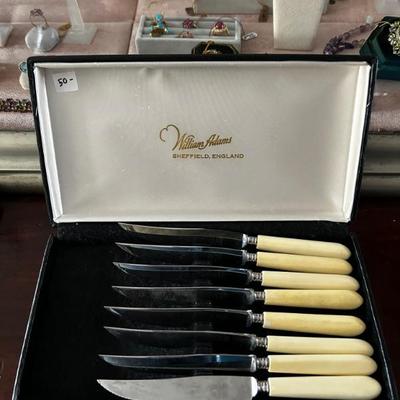 Steak knives by Sheffield England 