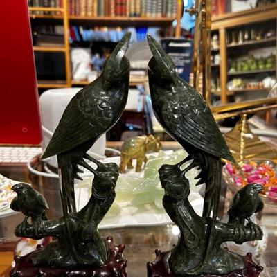 PAIR OF CHINESE SPINACH GREEN JADE CARVINGS Early 20th Century
In the form of birds perched on branch bases. 9.5” H