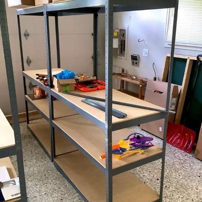 GRLI213 Metal Storage Shelving #2	 A pair of metal storage shelves. Comes with a few extra metal pieces, has wood decking. Metal pieces...