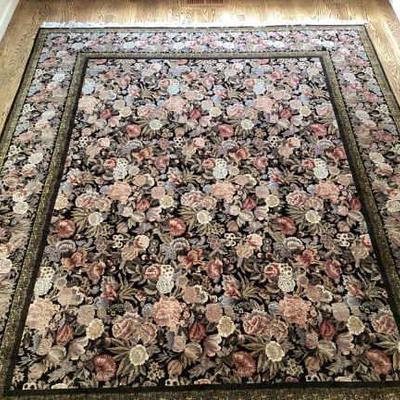 GRLI702 Large 10x8 Natural Fiber Area Rug	Black with floral pattern and two borders. Very heavy rug. Needs some cleaning. Comes with...
