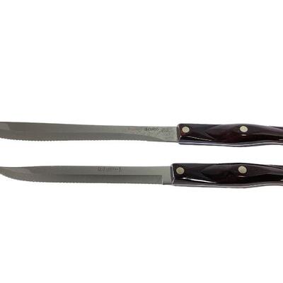 GRLI711 Cutco Knives	Two large, serrated edges, knives. They measure 7 & 8.5 inches. 
