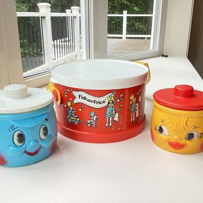 GRLI708 Vintage Mothecare Of England & Fisher-Price Toys	Two pots with lids, also called sauce pans. Made of plastic. Hard to find...