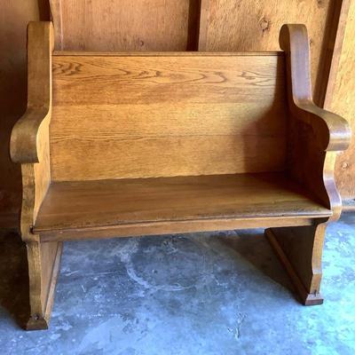BIGA326 Antique Oak Deacon’s Bench	Very ornate bench.  Measures approximately 39" Tall x 42.5" Wide x 24.5" Deep.
