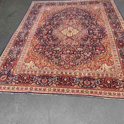 TOSH342 Vintage Large Area Rug	Rug is approximately 12' Long x 8'10" Wide.  The edges show some repair - see pics.  Colors...