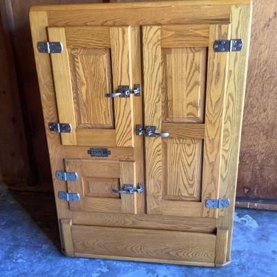 BIGA324 Vintage Belding Hall Century Refrigerator	Oak wood box chest cabinet.  Cabinet is approximately 35" Tall x 31.5" Wide x...