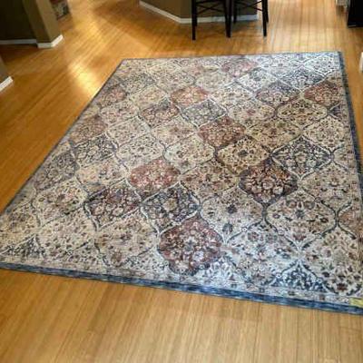 LIDE714 Large Area Rug By Taza	Approximately 8ft by 9.9 ft area rug.  Add in Turkey for KM Homes. Colors are blue with tans and light...