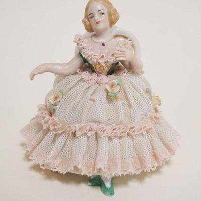1006	DRESDEN LACE FIGURE OF WOMAN SITTING IN A CHAIR, APPROXIMATELY 4 1/2 IN HIGH
