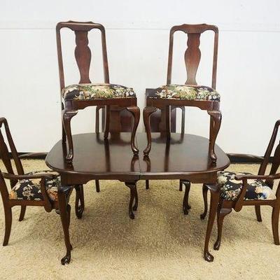 1185	QUEEN ANN STYLE CHERRY DINING ROOM TABLE W/2 LEAVES AND 6 CHAIRS, TABLE APPROXIMATELY 42 IN X 54 IN X 30 IN HIGH, LEAVES 16 IN
