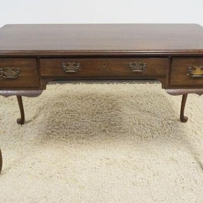 1168	PENNSYLVANIA HOUSE BLACK CHERRY 3 DRAWER WRITING TABLE ON QUEEN ANNE LEGS, APPROXIMATELY 50 IN X 24 IN X 30 IN H
