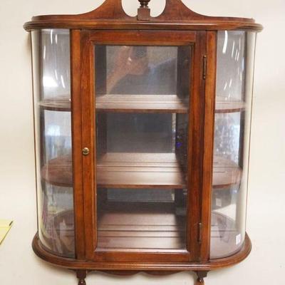 1152	MAHOGANY HANGING CURIO CABINET WITH CURVED GLASS SIDES AND MIRROR BACK, APPROXIMATELY 20 IN X 6 IN X 27 IN H
