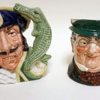 1023	2 ROYAL DOULTON TOBIES, CAPTAIN HOOK, PICKWICK, TALLEST APPROXIMATELY 7 IN
