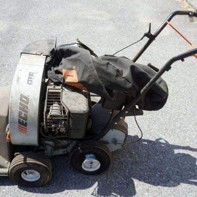1234	ECHO SYSTEM 2 CSV 82, CHIPPER, SHREDDER, VACUUM, 8 HP, TIRES NEED INFLATING

