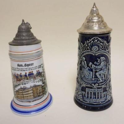 1079	2 GERMAN PREWAR PORCELAIN STIENS WITH PEWTER LIDS, 1 WITH LITHOPHANE OF COUPLE DANCING, TALLEST APPROXIMATELY 10 1/2 IN
