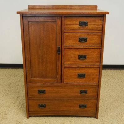 1162	MASTER CRAFT MISSION OAK STYLE 6 DRAWER CHEST WITH 1 DOOR, DRAWERS ARE CEDAR LINED, APPROXIMATELY 38 IN X 21 IN X 56 IN H
