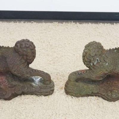 1124	PAIR OF CAST METAL ASIAN GARDEN FOO DOGS, EACH APPROXIMATELY 24 IN X 12 IN X 19 IN H, 1 HAS CRACK
