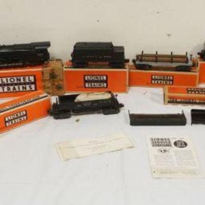 1298	LIONEL TRAIN NO 1459 WS FREIGHT TRAIN INCLUDING NO 2020 LOCOMOTIVE, NO 6020 TENDER W/WHISTLE, NO 3469 X AUTOMATIC DUMP CAR, NO 6411...