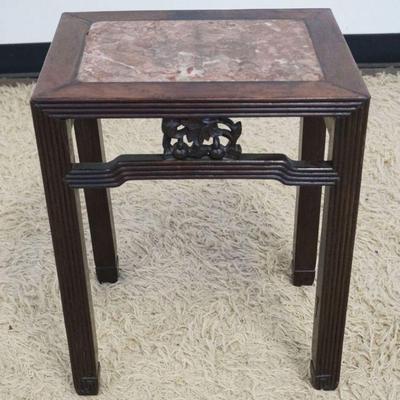 1129	ANTIQUE ASIAN STAND WITH BROWN MARBLE INSET TOP, CARVED FRUIT AND REEDED LEGS, APPROXIMATELY 17 IN X 12 IN X 21 IN H
