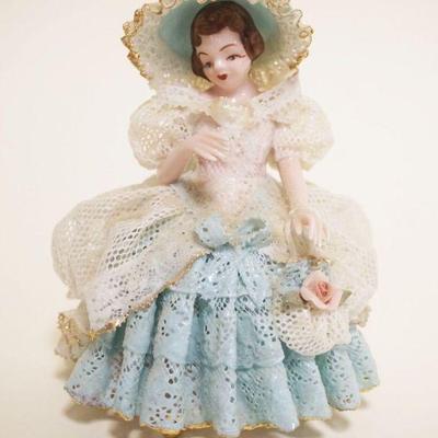 1004	DRESDEN LACE FIGURE OF WOMAN W/BONNET, APPROXIMATELY 4 1/2 IN HIGH
