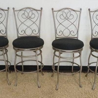 1184	BAR STOOLS LOT OF 4, FANCY IRON BAR STOOLS W/UPHOLSTERED SEATS THAT SWIVEL, APPROXIMATELY 43 IN HIGH
