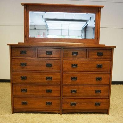 1163	MASTER CRAFT MISSION OAK STYLE 12 DRAWER CHEST WITH MIRROR TOP, DRAWERS ARE CEDAR LINED, APPROXIMATELY 19 IN X 65 IN X 72 IN H
