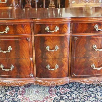 1176	MAHOGANY 9 DRAWER LOW CHEST WITH CARVED SIDES AND SKIRT, VENEER LOSS TO FRONT DRAWER AND WEAR TO TOP, APPROXIMATELY 67 IN X 22 IN X...
