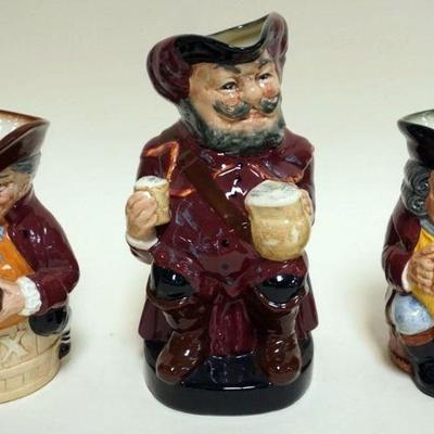 1024	3 ROYAL DOULTON TOBIES, SIR JOHN FALSTAFF, TOBY, JOLLY TOBY, TALLEST APPROXIMATELY 8 1/4 IN
