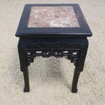 1128	ANTIQUE ASIAN STAND WITH BROWN MARBLE INSET TOP AND CARVED LEGS AND SKIRT, APPROXIMAATELY 14 IN X 14 IN X 19 IN H
